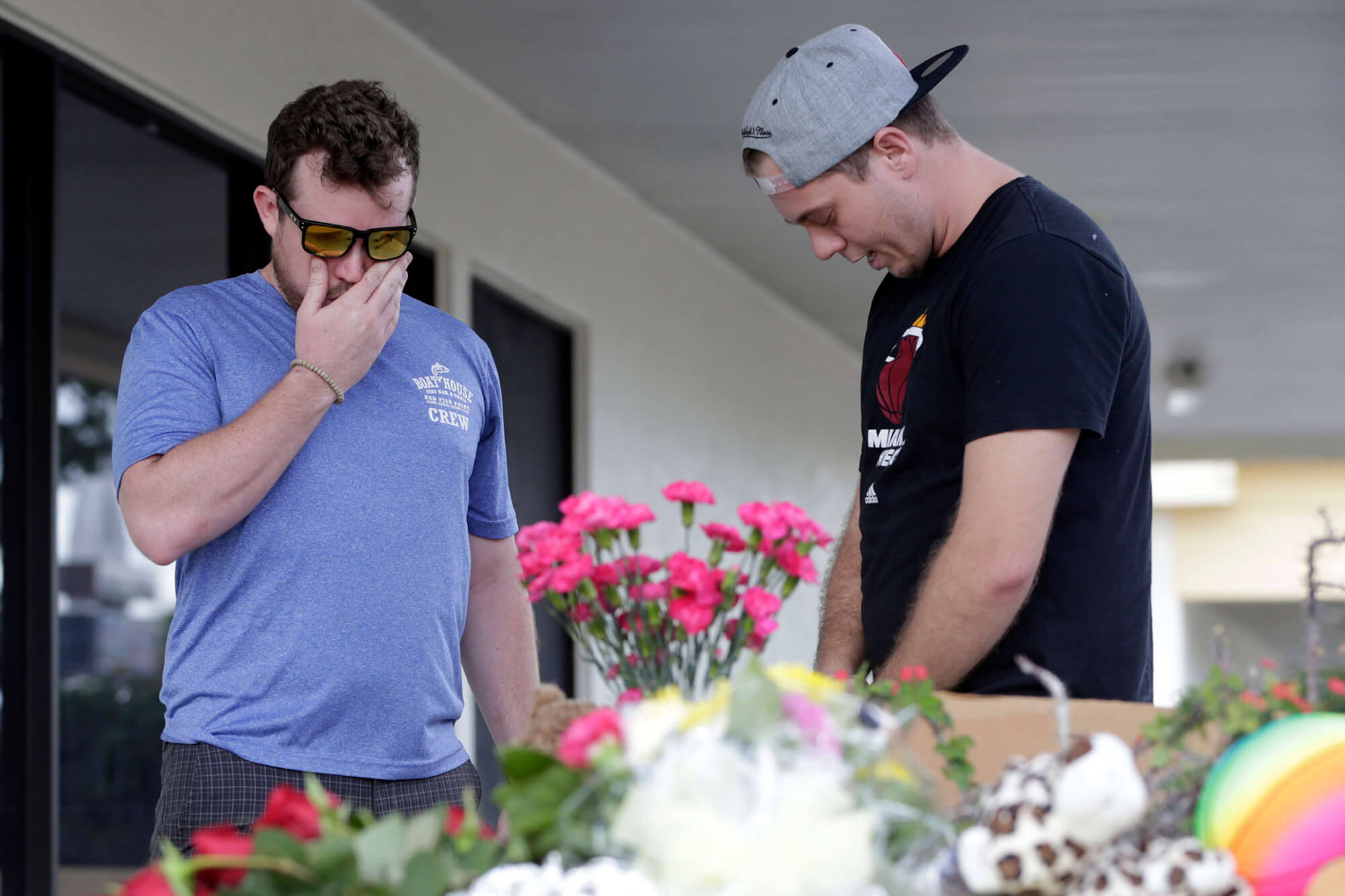 Image of friends mourning the death of Stef'an Strawder, 18.