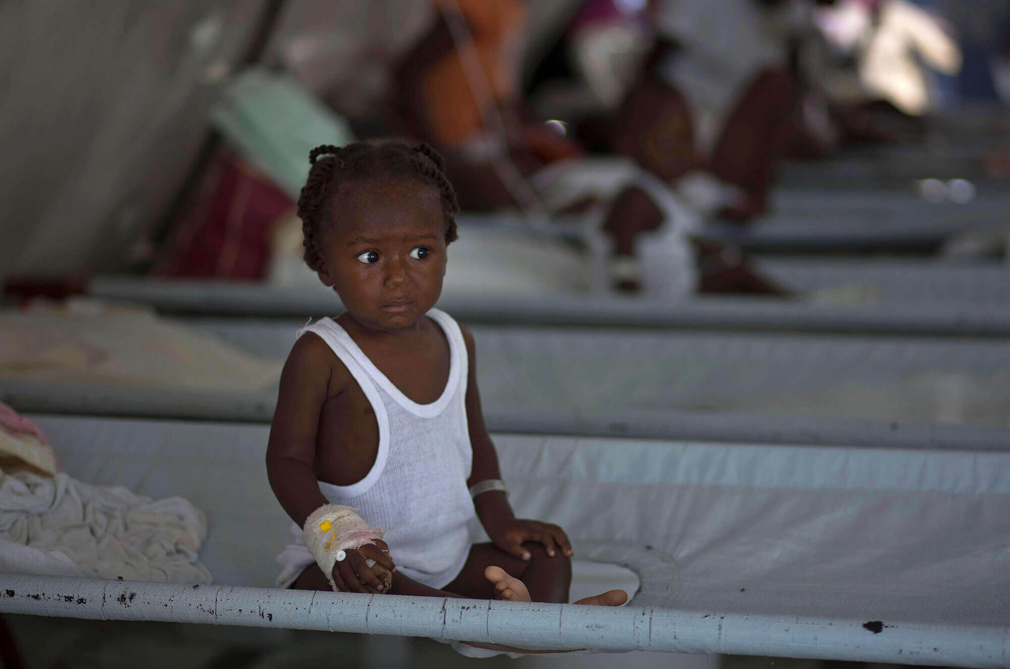 Image of A girl in the hospital receiving treatment for cholera symptoms