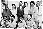 The Little Rock Nine pictured with Daisy Bates, the president of the Arkansas NAACP.