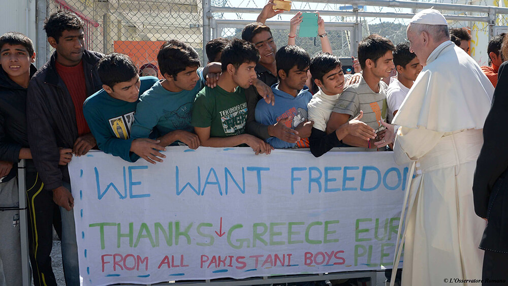 Pope Francis greets refugees in Greece