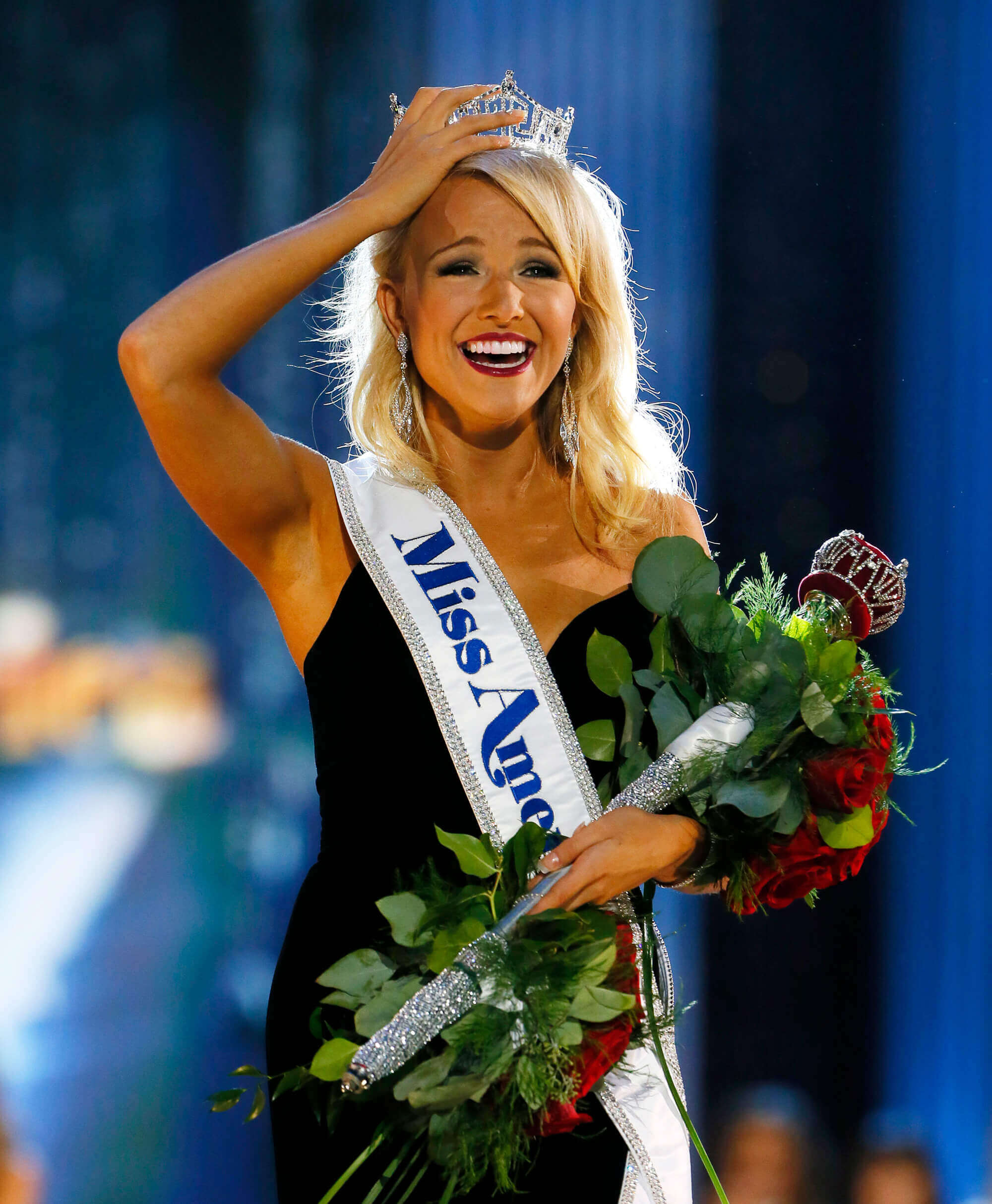 Image of Savvy Shields with roses and crown