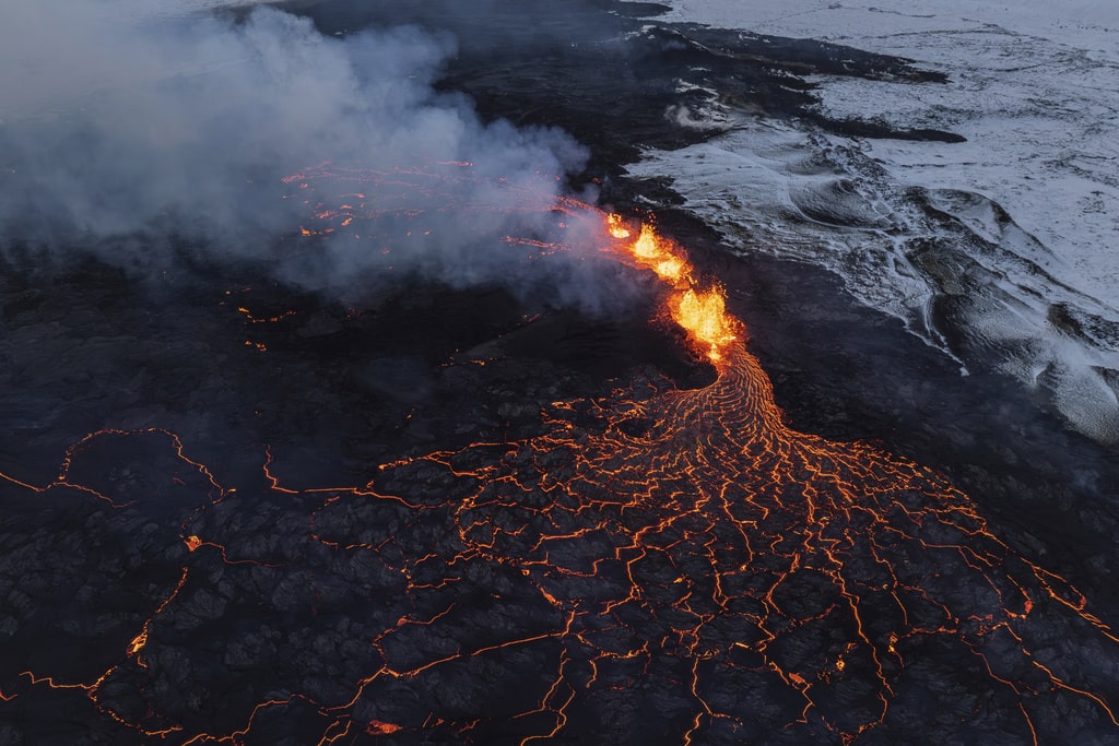 A close up of the Southern active segment of the original fissure of an active volcano in Grindavik on Iceland's Reykjanes Peninsula, Tuesday, Dec. 19, 2023.