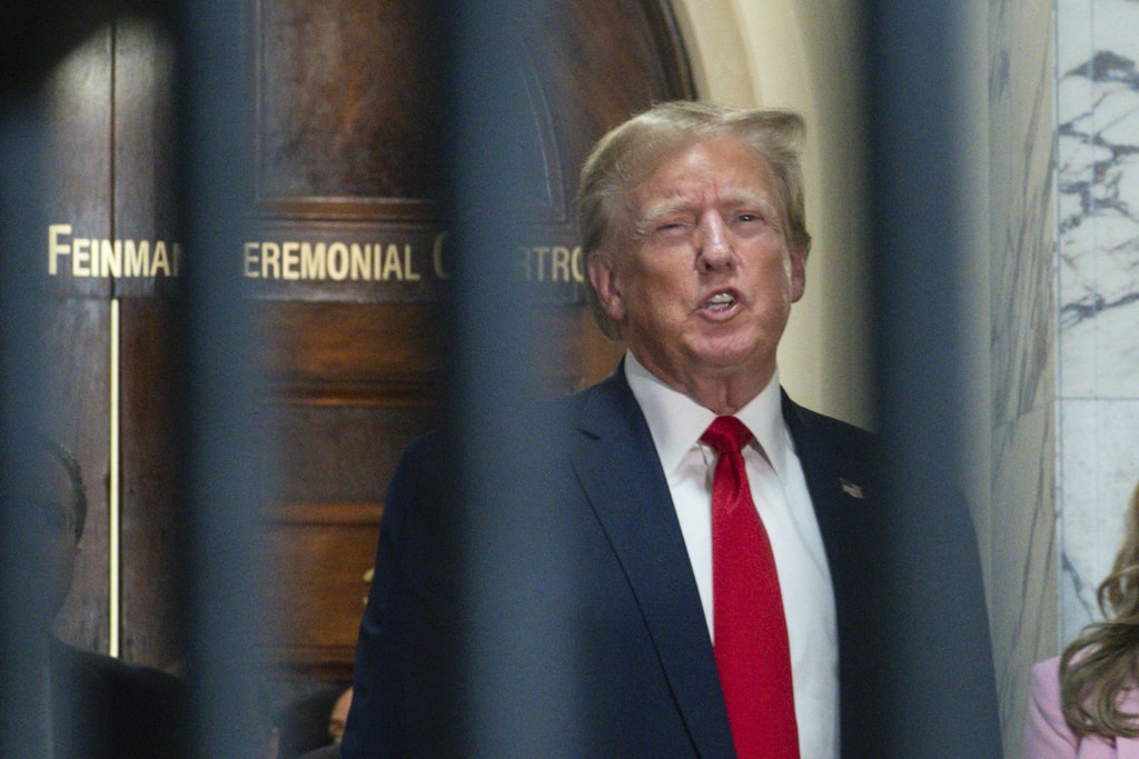 Former President Donald Trump speaks after exiting the courtroom for a break during is civil business fraud trial at New York Supreme Court, Thursday, Dec. 7, 2023, in New York.