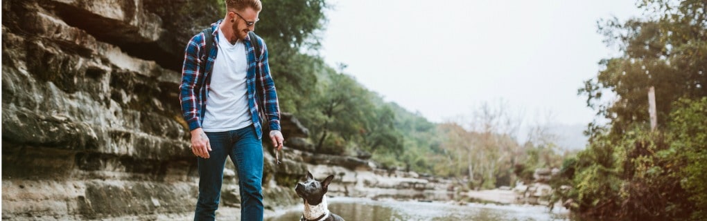 Man and dog hiking