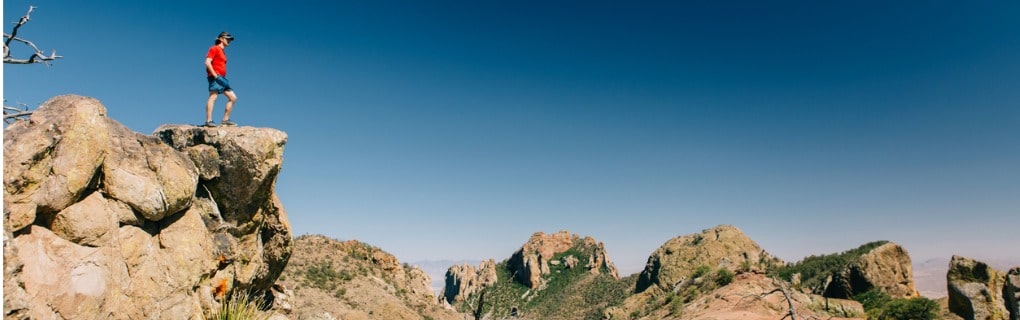 Man standing over desert